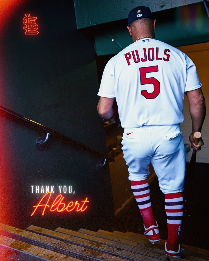 Albert Pujols descends down the stairs of the dugout to the clubhouse.