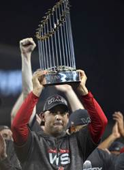 Image result for alex cora red sox manager world series trophy puerto rico