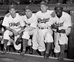 Brooklyn Dodgers baseball players, from left, John Jorgensen, Pee Wee Reese, Ed Stanky and Jackie Robinson pose at Ebbets Field on April 15, 1947, in New York. (AP)