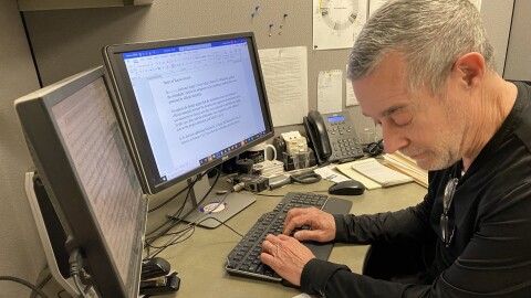  KCUR news editor Dan Margolies at his desk.