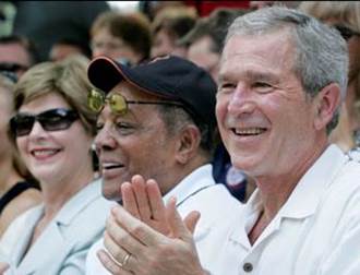 President George W. Bush and Laura Bush are joined by baseball legend and  hall of famer