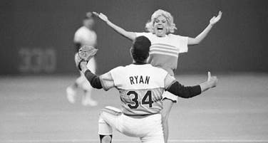Morganna “The Kissing Bandit” turned 1970s‑'80s ballgames into showtime,  vaulting fences to plant surprise kisses on stars like Pete Rose and Nolan  Ryan, racking up 20 arrests and a forever spot in